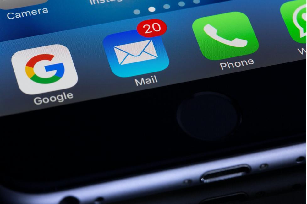 magnified iphone screen showing email app