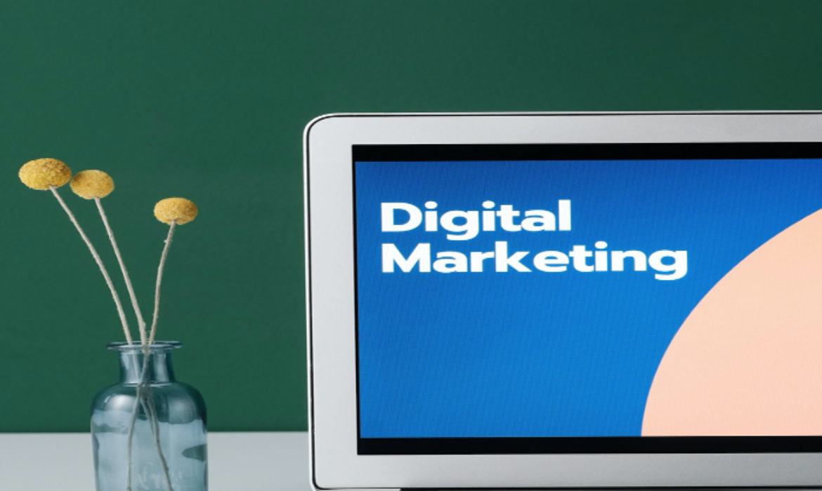 A laptop displaying Digital Marketing